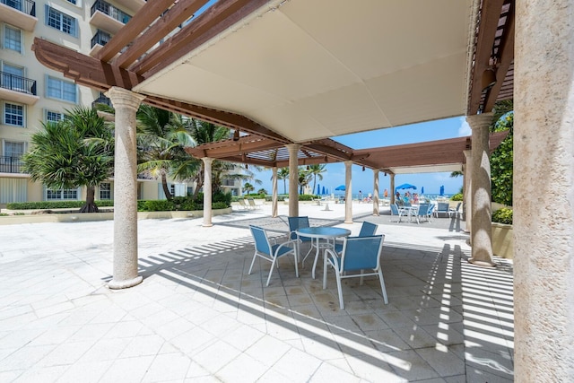 view of patio featuring a pergola