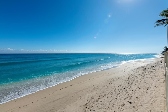 property view of water with a beach view