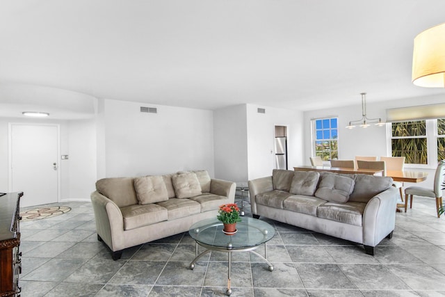 3475 S Ocean Blvd Unit 2160, Palm Beach, FL 33480 - living area with a chandelier