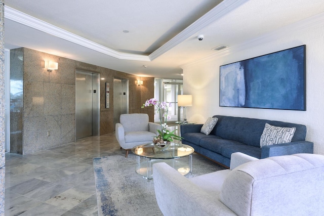 living room with elevator, visible vents, a tray ceiling, and ornamental molding