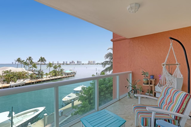 balcony with a city view and a water view