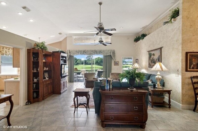 tiled living room with ceiling fan, ornamental molding, and lofted ceiling