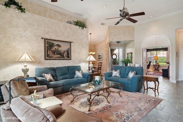 tiled living room with crown molding and ceiling fan