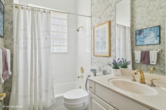 full bathroom featuring vanity, shower / bathtub combination with curtain, and toilet