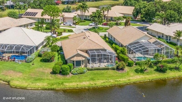 bird's eye view with a water view