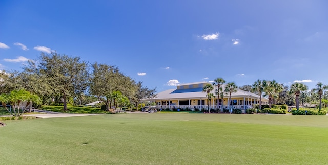 view of community featuring a lawn