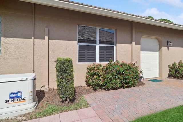 view of home's exterior featuring a garage