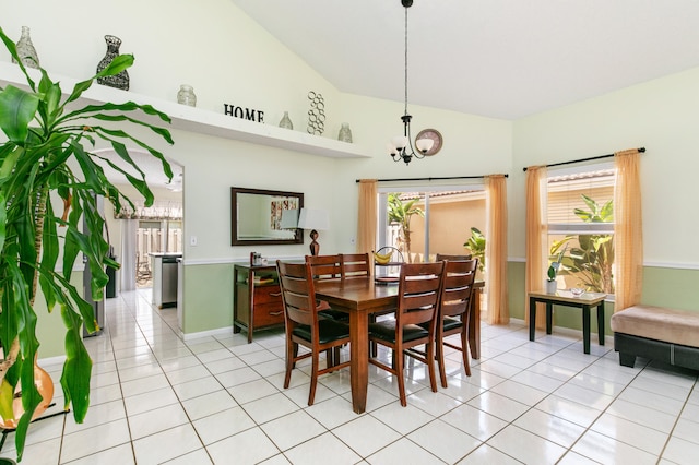 tiled dining area featuring high vaulted ceiling, a chandelier, and a healthy amount of sunlight