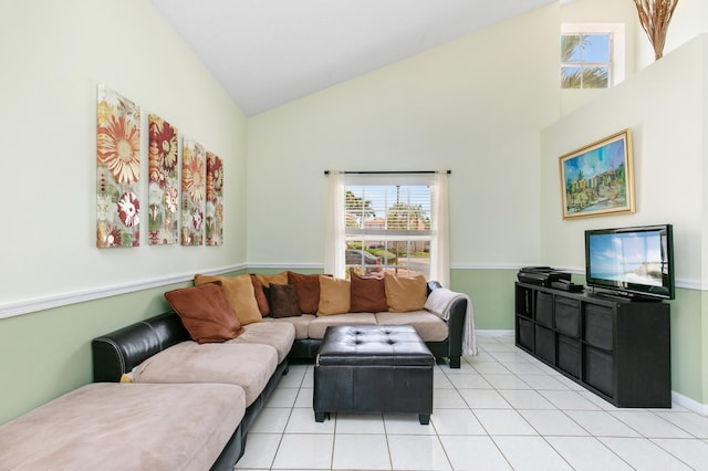 tiled living room with high vaulted ceiling