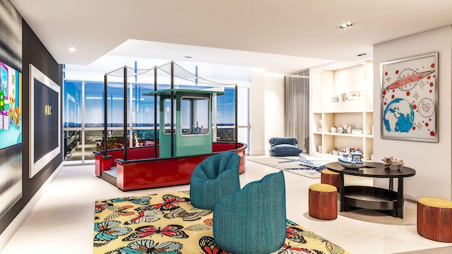 carpeted living room with plenty of natural light