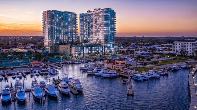 aerial view at dusk with a water view