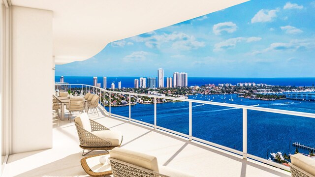 balcony featuring a water view