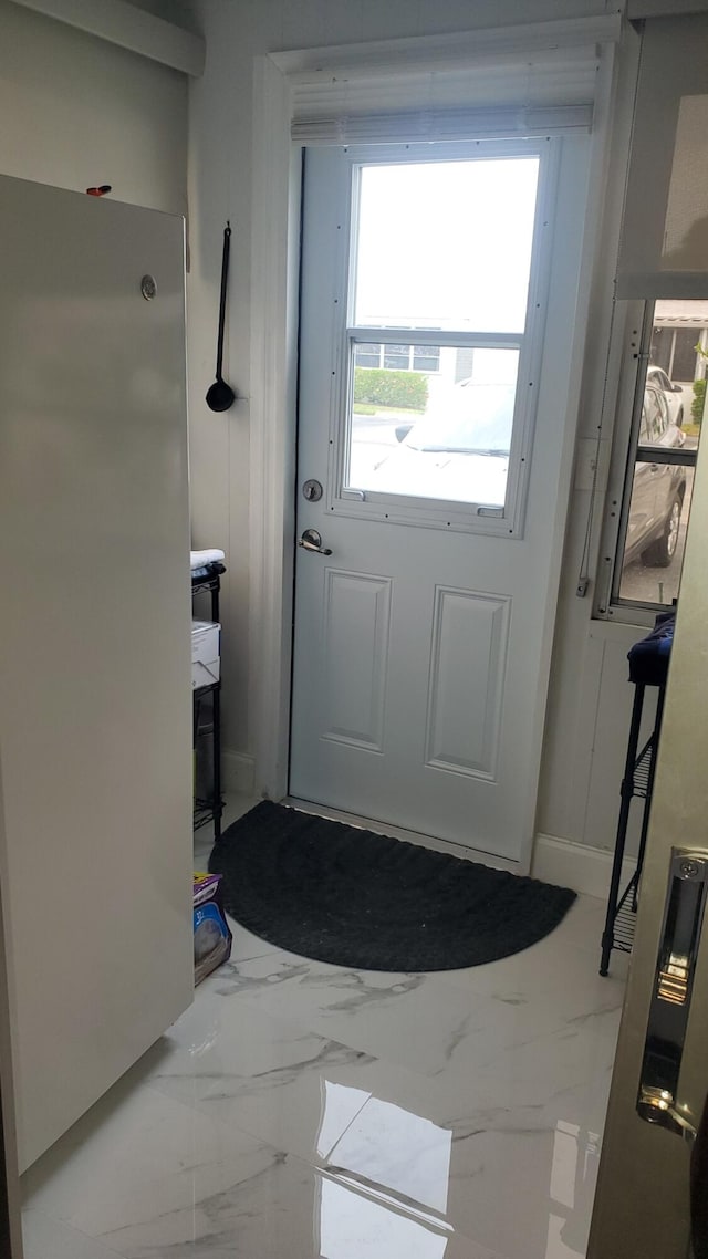 doorway featuring tile patterned floors