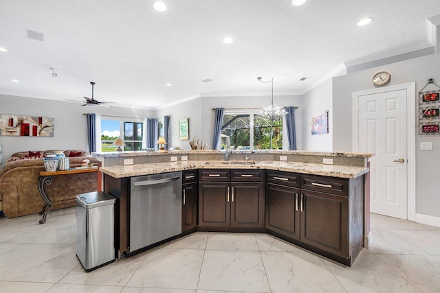 kitchen featuring ceiling fan with notable chandelier, a wealth of natural light, a kitchen island with sink, and stainless steel dishwasher