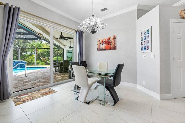 dining area featuring crown molding and ceiling fan with notable chandelier