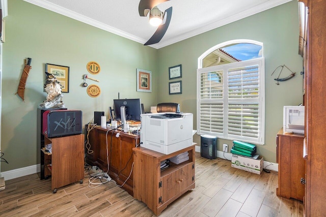 office with light wood-type flooring, crown molding, and a textured ceiling