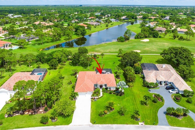 bird's eye view with a water view