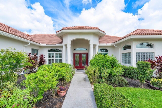 doorway to property featuring french doors