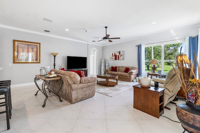 living room featuring ceiling fan and ornamental molding