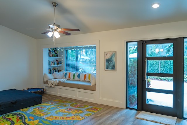 interior space featuring ceiling fan and hardwood / wood-style floors