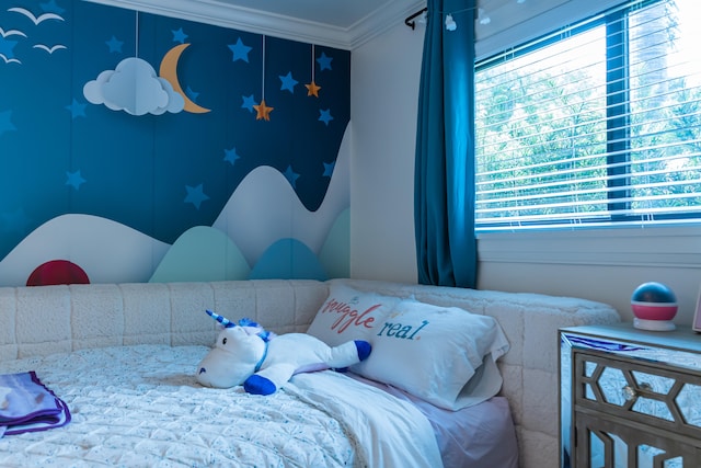 bedroom featuring crown molding