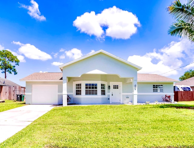 single story home with a front lawn and a garage