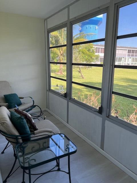 sunroom featuring plenty of natural light