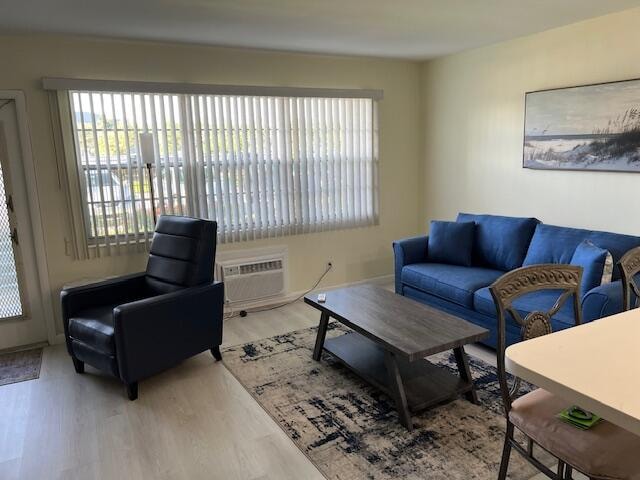 living room with light hardwood / wood-style flooring