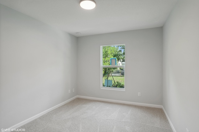 empty room featuring carpet floors