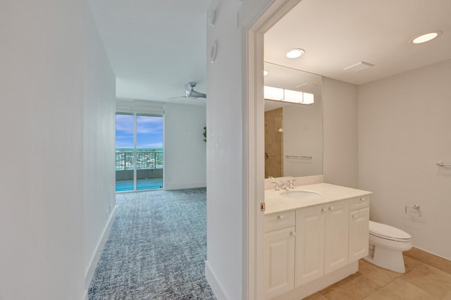 full bathroom with toilet, recessed lighting, a ceiling fan, vanity, and baseboards