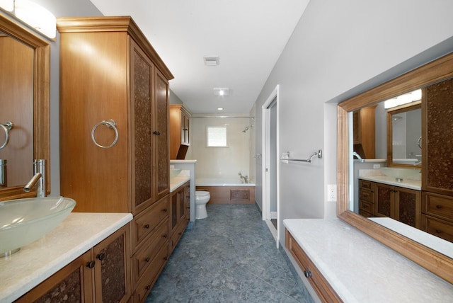 full bathroom with tile patterned flooring, toilet, vanity, and shower / washtub combination