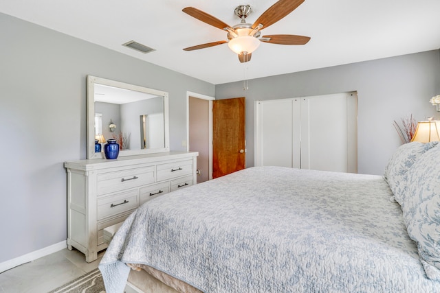 bedroom featuring ceiling fan and light tile patterned floors