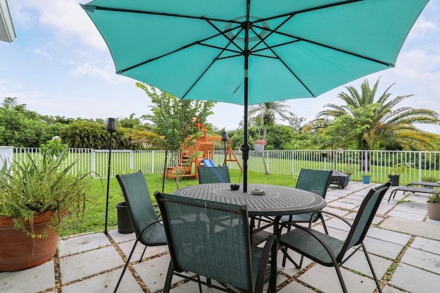 view of patio with a playground