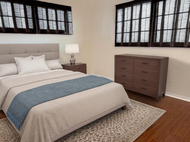4908 Eaglewood Rd Unit A, Boynton Beach, FL 33436 - bedroom with baseboards, multiple windows, and dark wood-type flooring