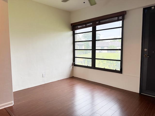 4908 Eaglewood Rd Unit A, Boynton Beach, FL 33436 - spare room featuring ceiling fan and dark wood-style floors