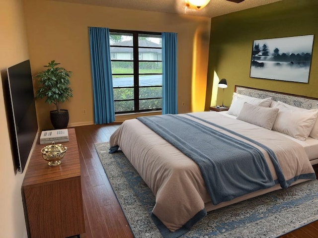 4908 Eaglewood Rd Unit A, Boynton Beach, FL 33436 - bedroom featuring wood finished floors and baseboards