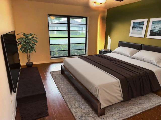4908 Eaglewood Rd Unit A, Boynton Beach, FL 33436 - bedroom with baseboards and wood-type flooring