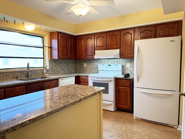 4908 Eaglewood Rd Unit A, Boynton Beach, FL 33436 - kitchen with a sink, ventilation hood, light stone countertops, ceiling fan, and white appliances