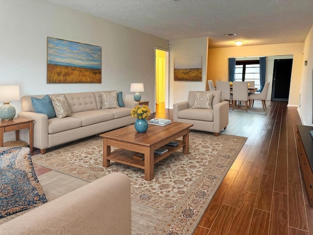 4908 Eaglewood Rd Unit A, Boynton Beach, FL 33436 - living room with a textured ceiling and wood finished floors