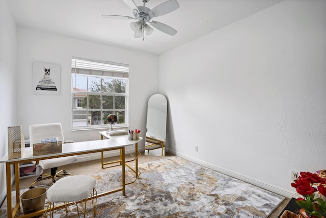 office area featuring ceiling fan and carpet floors