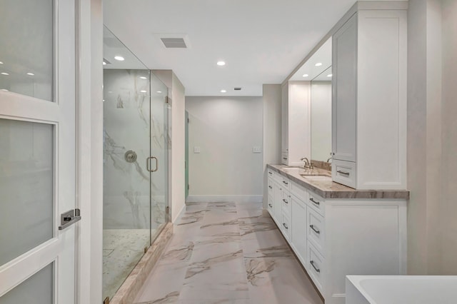 bathroom with shower with separate bathtub, double sink vanity, and tile patterned floors