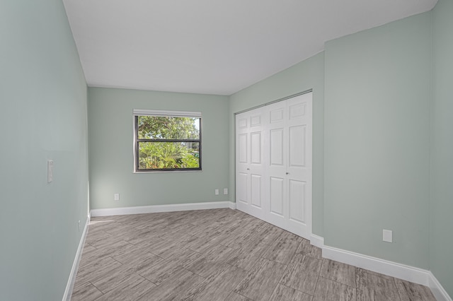 unfurnished bedroom featuring a closet