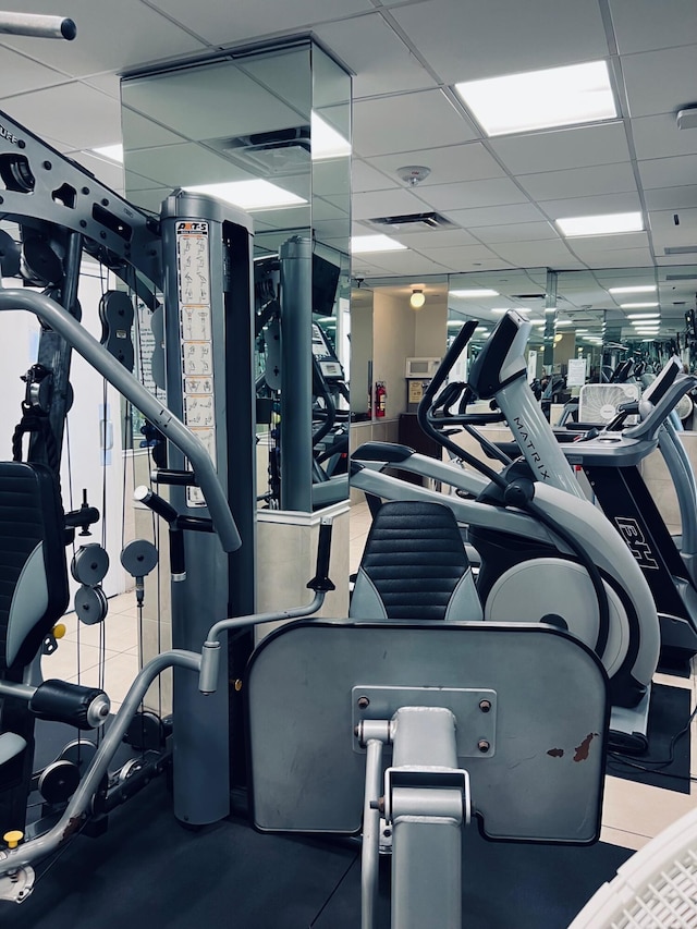 gym with a drop ceiling