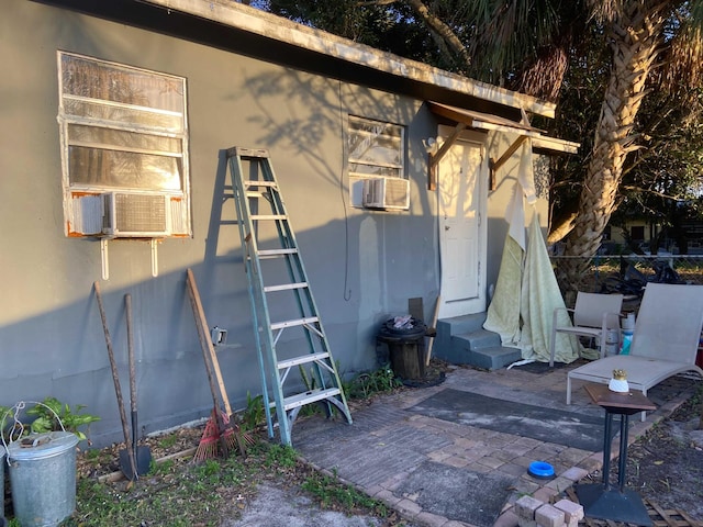 exterior space featuring cooling unit and a patio area