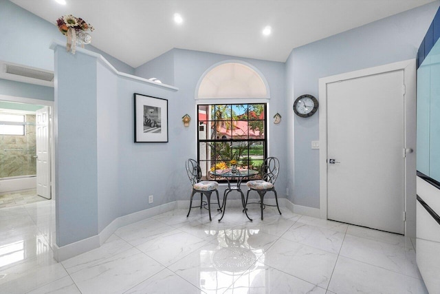 dining room featuring a wealth of natural light and light tile patterned floors