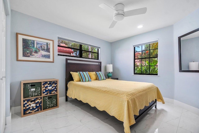 bedroom with light tile patterned flooring and ceiling fan