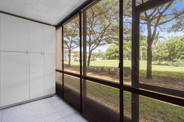 unfurnished sunroom featuring a healthy amount of sunlight