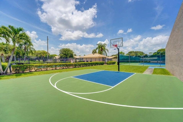 view of basketball court with tennis court