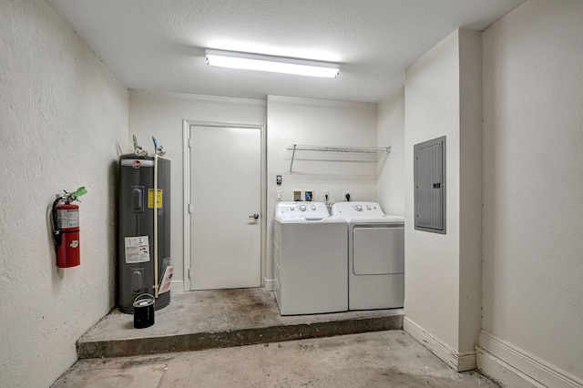 washroom with independent washer and dryer, electric panel, electric water heater, and a textured ceiling