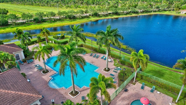 birds eye view of property featuring a water view